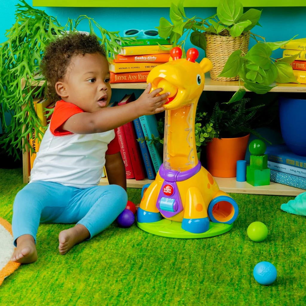 Hračka hudobná žirafa Spin & Giggle™ 12m+ 
