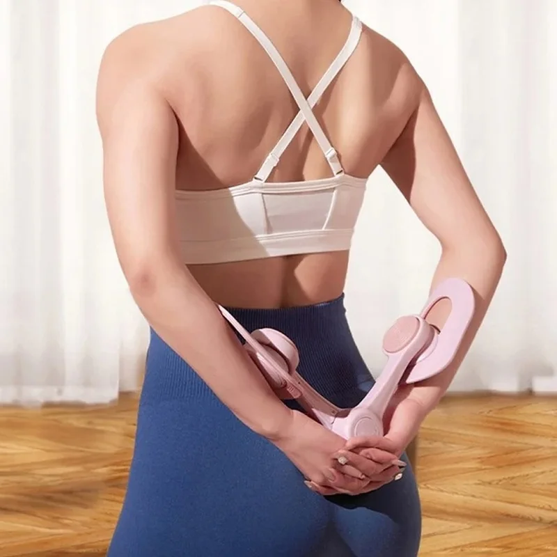 Merach Trainer trenažér na stehná a panvové dno, ružový