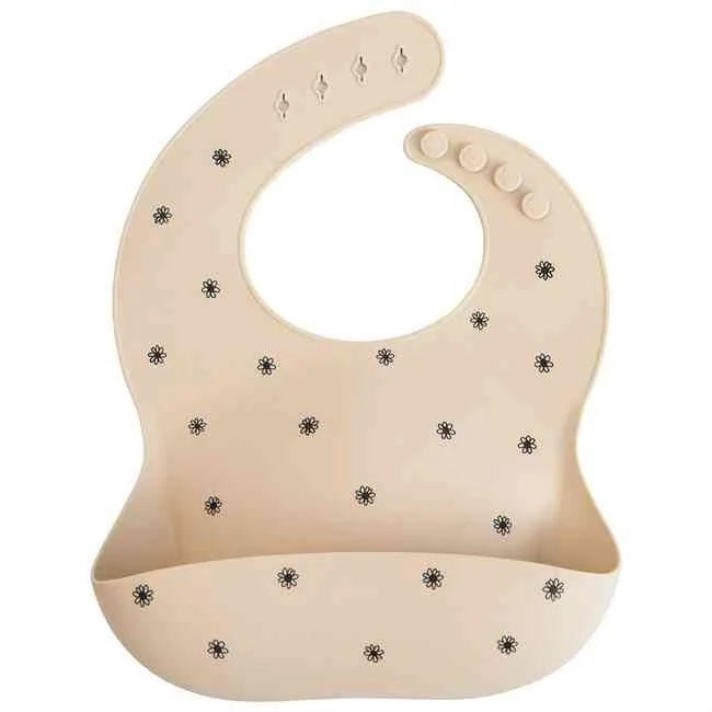 Mushie silikónový podbradník, Black Daisy 1×1 ks, podbradník