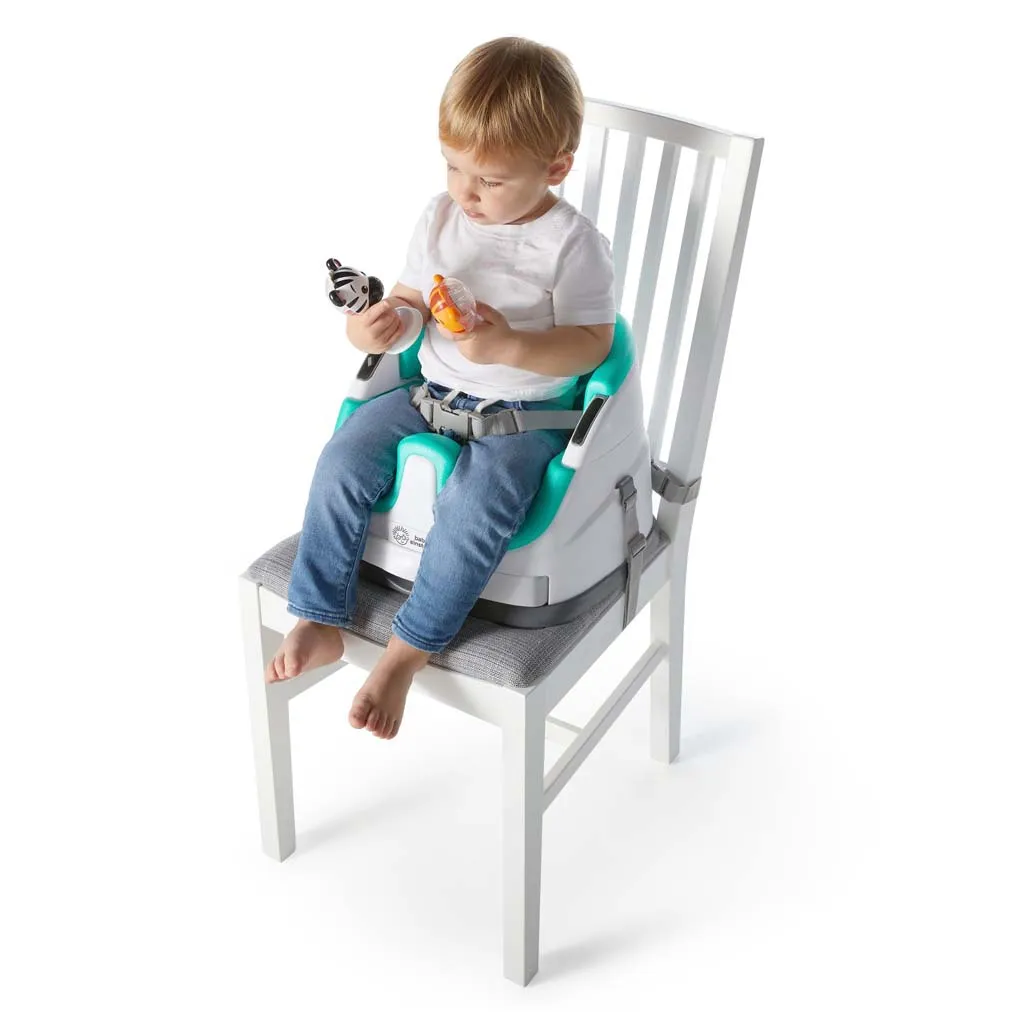 BABY EINSTEIN Podsedák na stoličku s 2 hračkami 2v1 Dine & Discover 6m+ do 23 kg 1×1 ks, podsedák na stoličku