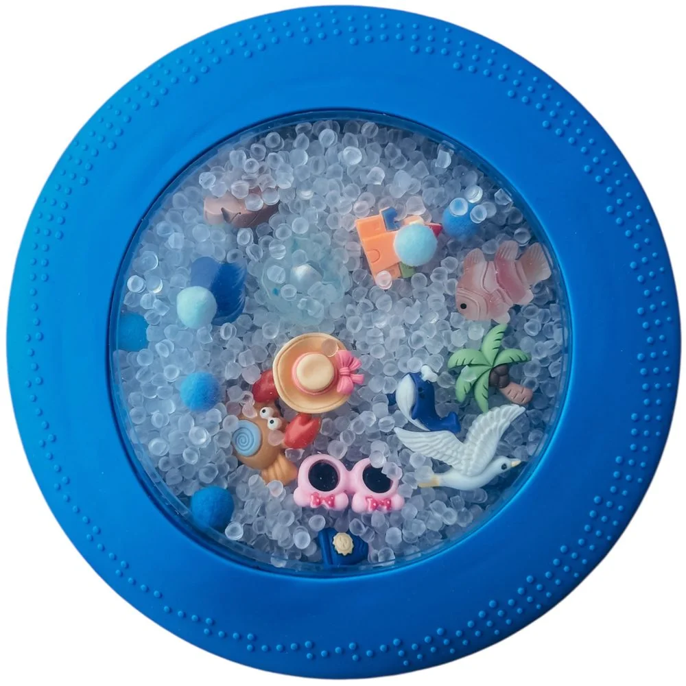 Senzorický disk Peekaboo pláž, silikónová hračka