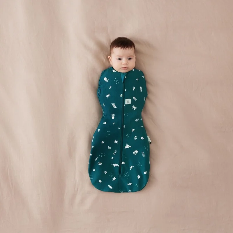 ERGOPOUCH - Zavinovačka a vak na spanie 2v1 Cocoon Ocean 3-6 m, 6-8 kg, 0,2 tog