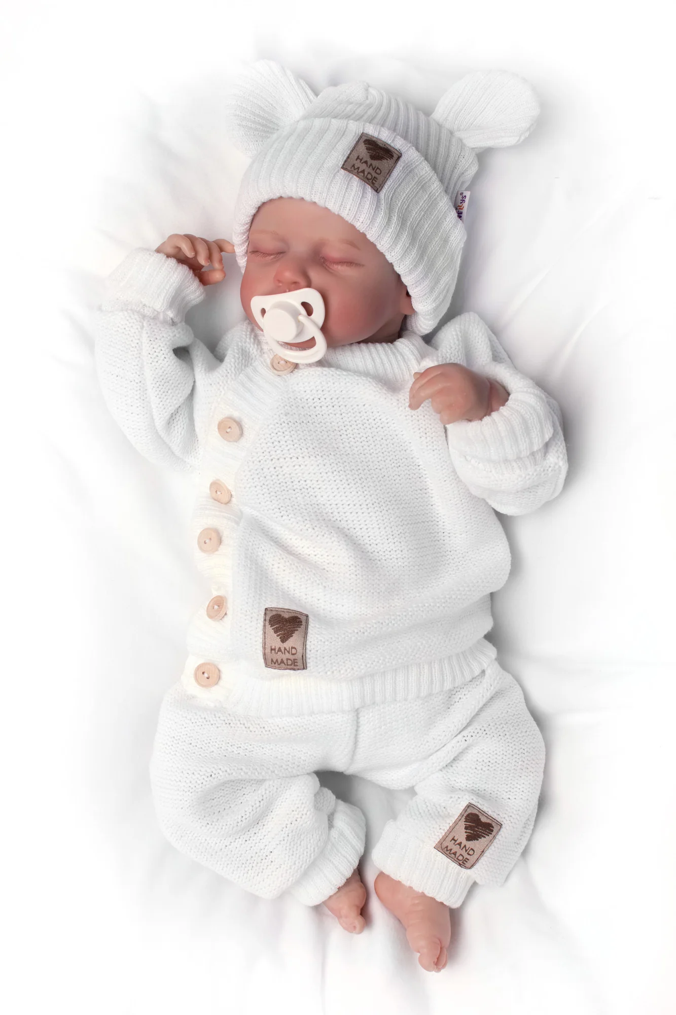 Pletené dojčenské nohavice Hand Made Baby Nellys, biele
