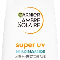 Garnier Ambre Solaire Super UV denný fluid proti nedokonalostiam s niacínamidom a SPF 50+