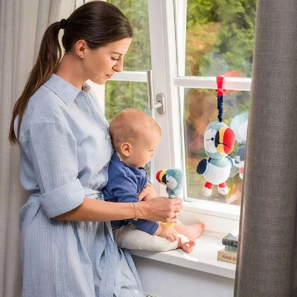 BabyOno Edukačná hračka s pískatkom a hryzátkom Tukan