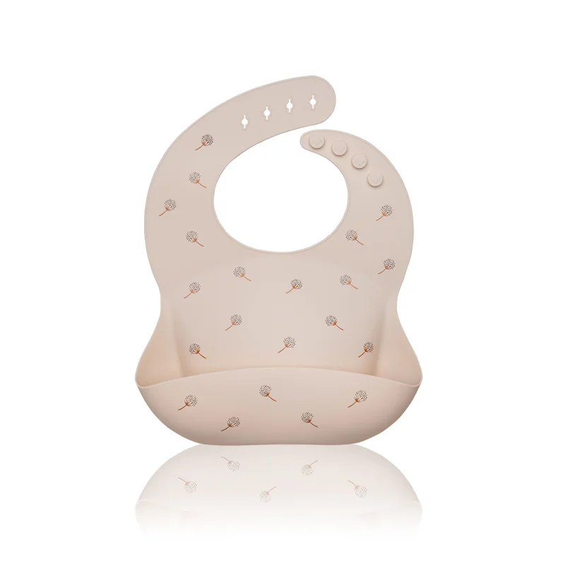 PETITE&MARS Podbradník silikónový Sam Beige Dandelion 1×1 ks, silikónový podbradník