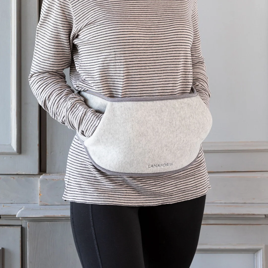 Viacúčelový hrejivý vankúš Waist Warmer