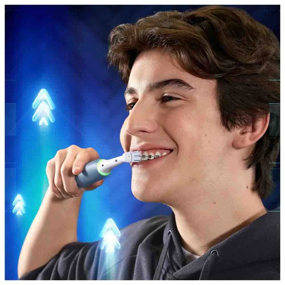 Oral-B EK iO Teen Blue + držiak zubnej kefky + cestovné púzdro + 1NH 1×1 set, elektrická zubná kefka